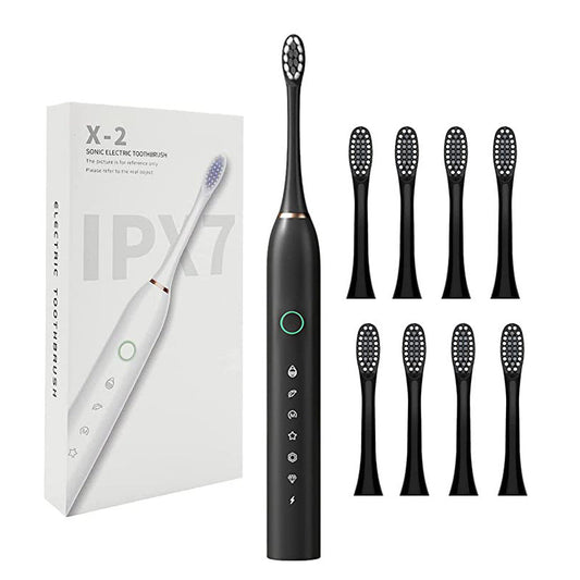 Electric toothbrush with rechargeable ultrasonic cleaning