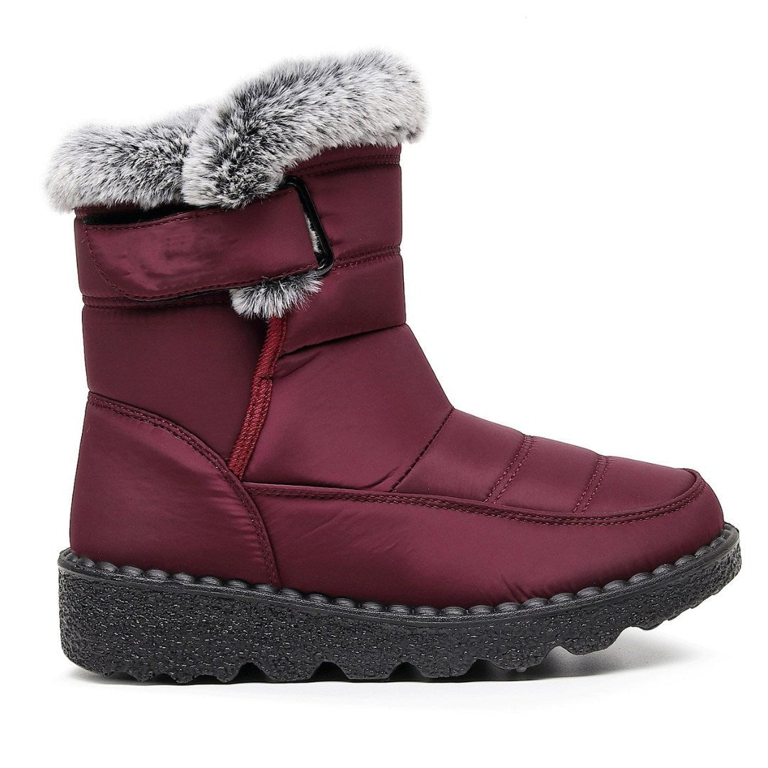 Waterproof heeled winter boots for women